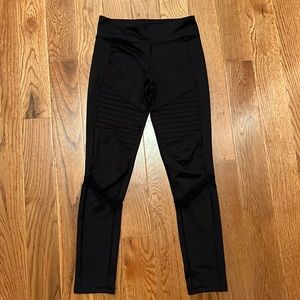 Old navy, black with some texture on the outside, girls medium leggings.